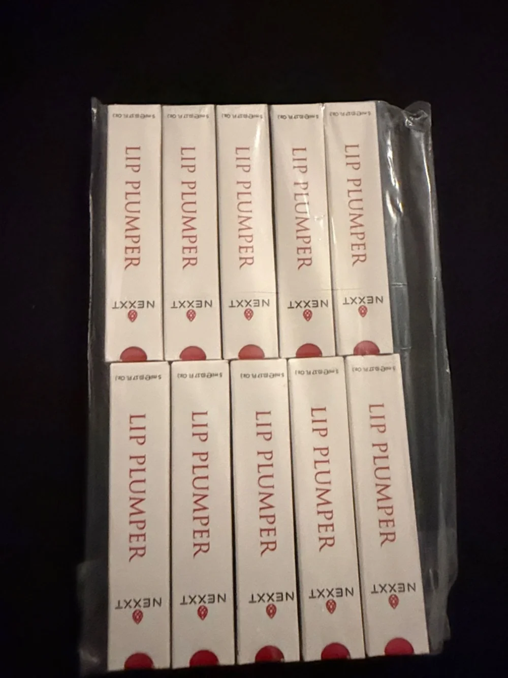 Nexxt Lip Plumper - White & Red Retail Boxes-2 for $25